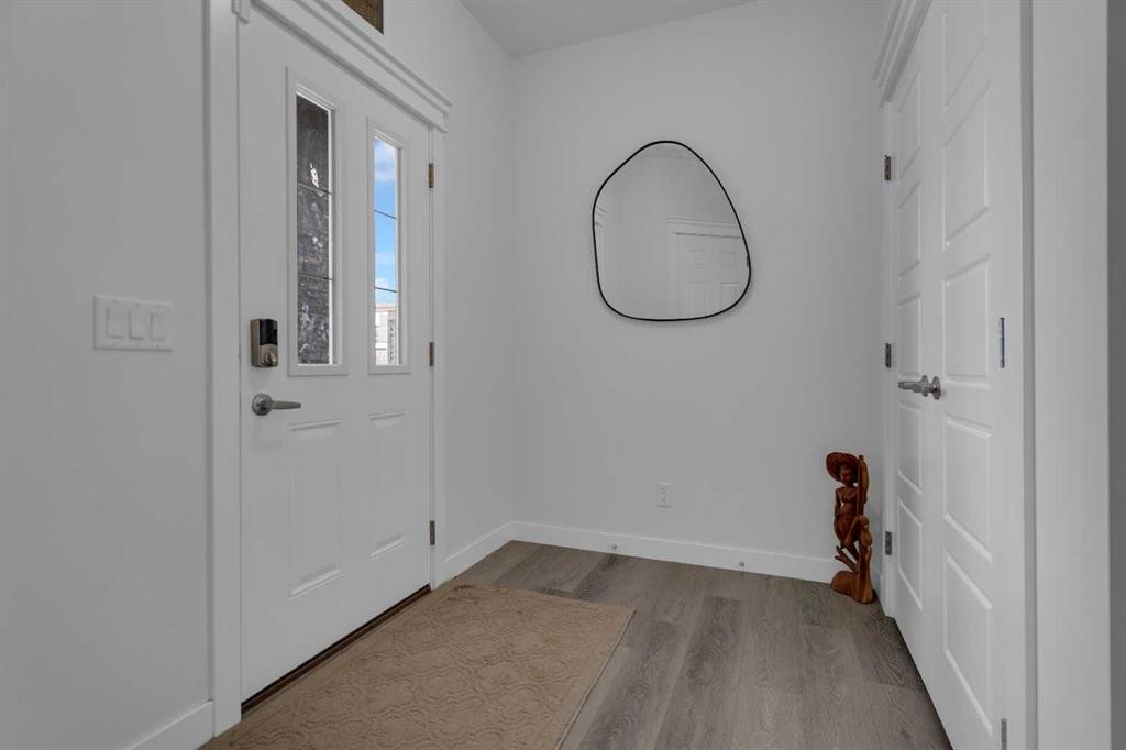 #208 Dawson Harbour Heights, Chestermere, AB - Indoor Photo Showing Other Room
