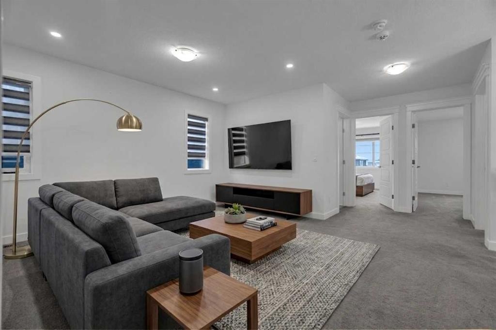 #208 Dawson Harbour Heights, Chestermere, AB - Indoor Photo Showing Living Room