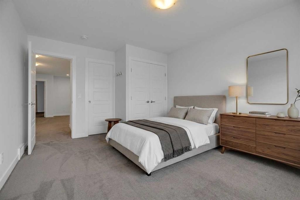 #208 Dawson Harbour Heights, Chestermere, AB - Indoor Photo Showing Bedroom