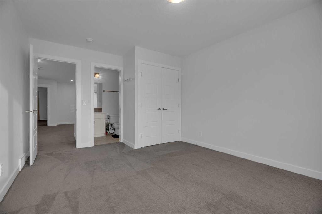 #208 Dawson Harbour Heights, Chestermere, AB - Indoor Photo Showing Other Room