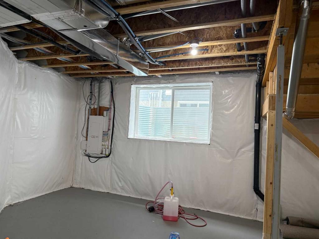 #208 Dawson Harbour Heights, Chestermere, AB - Indoor Photo Showing Basement