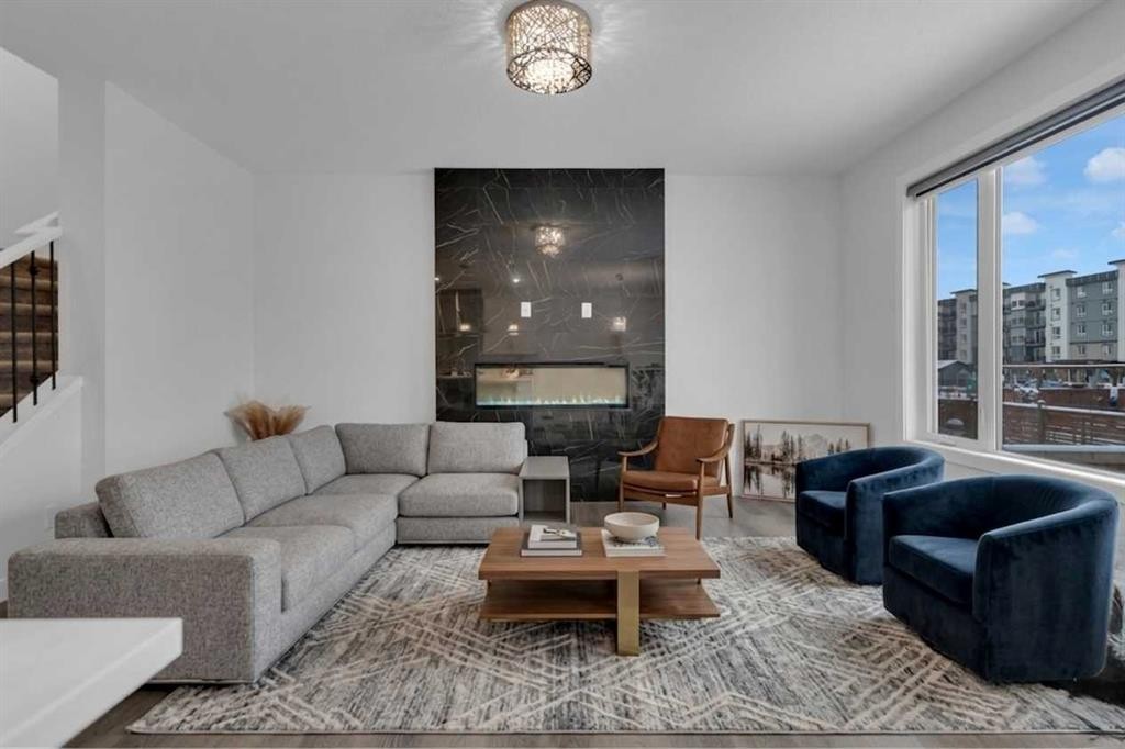 #208 Dawson Harbour Heights, Chestermere, AB - Indoor Photo Showing Living Room