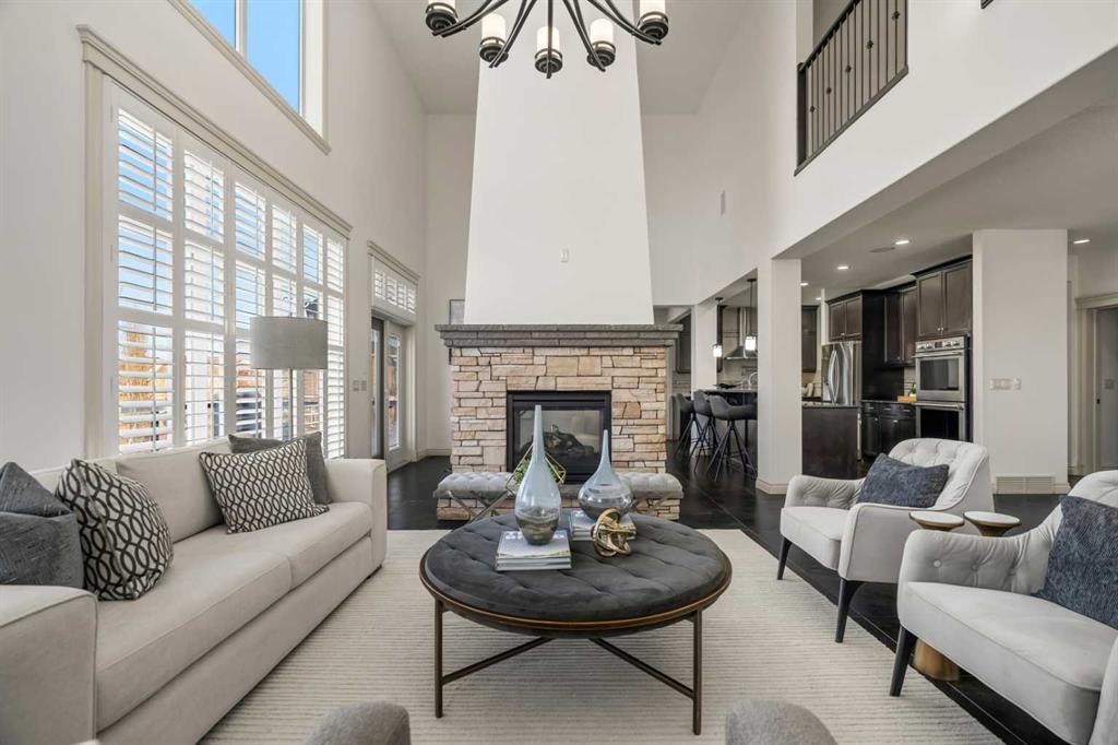151 Mahogany Bay Se, Calgary, AB - Indoor Photo Showing Living Room With Fireplace