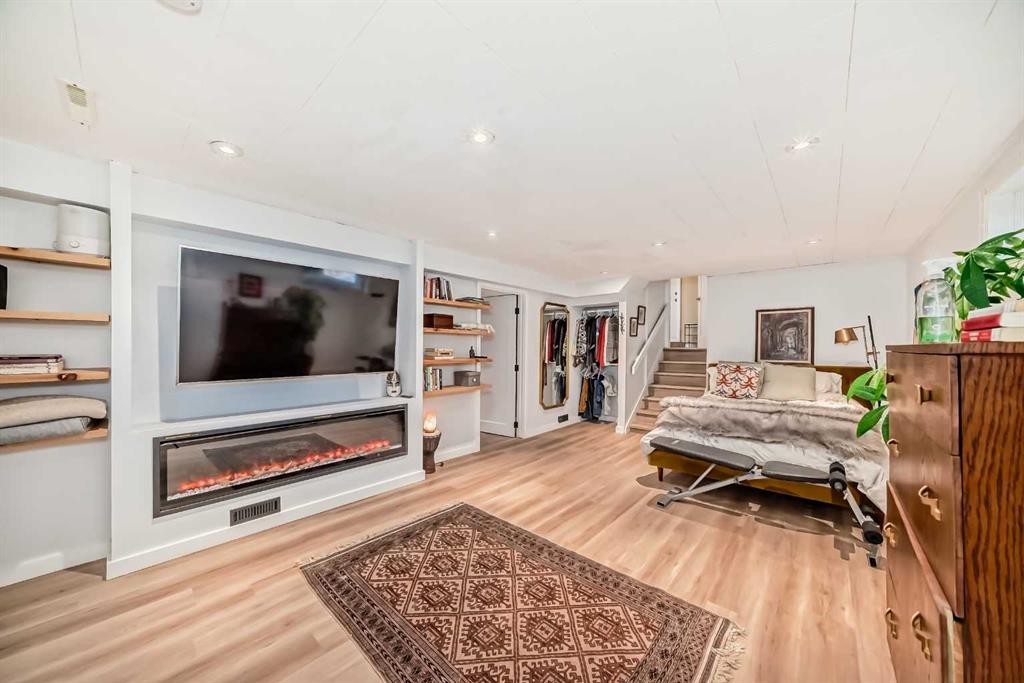 91 Chisholm Crescent Nw, Calgary, AB - Indoor Photo Showing Living Room With Fireplace