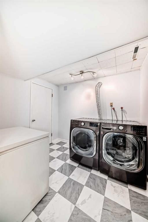 91 Chisholm Crescent Nw, Calgary, AB - Indoor Photo Showing Laundry Room