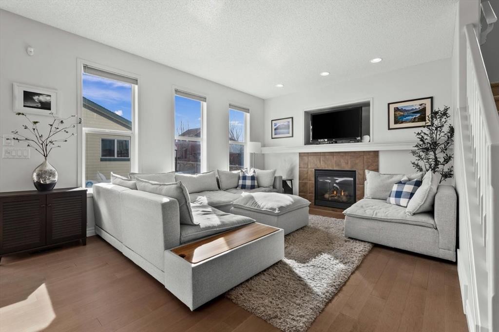 800 Prestwick Circle Se, Calgary, AB - Indoor Photo Showing Living Room With Fireplace