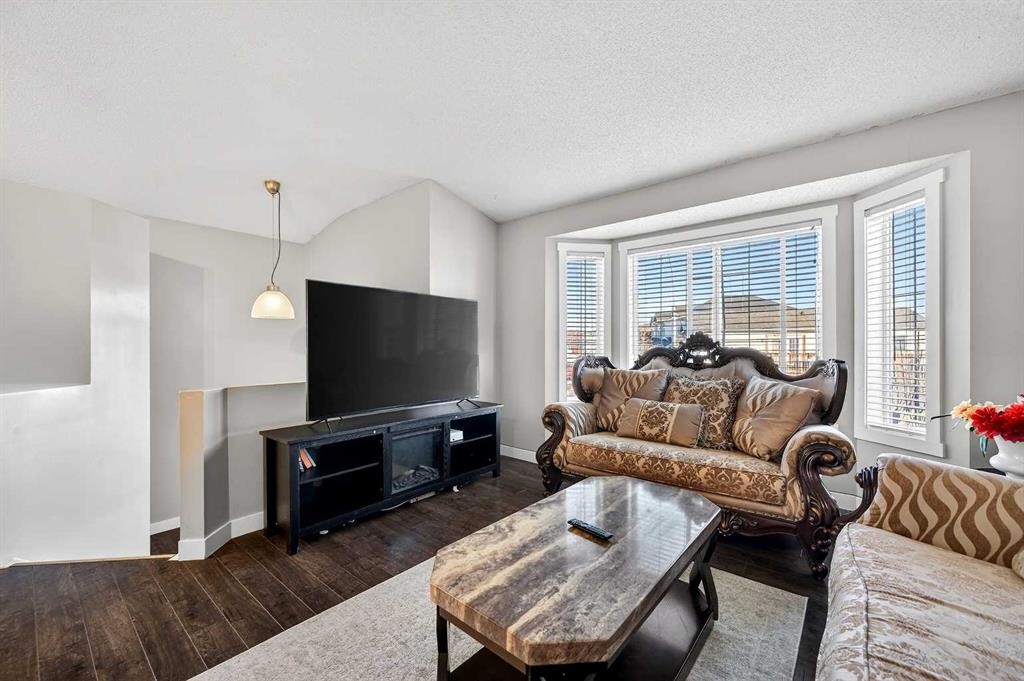 312 Martin Crossing Way Ne, Calgary, AB - Indoor Photo Showing Living Room