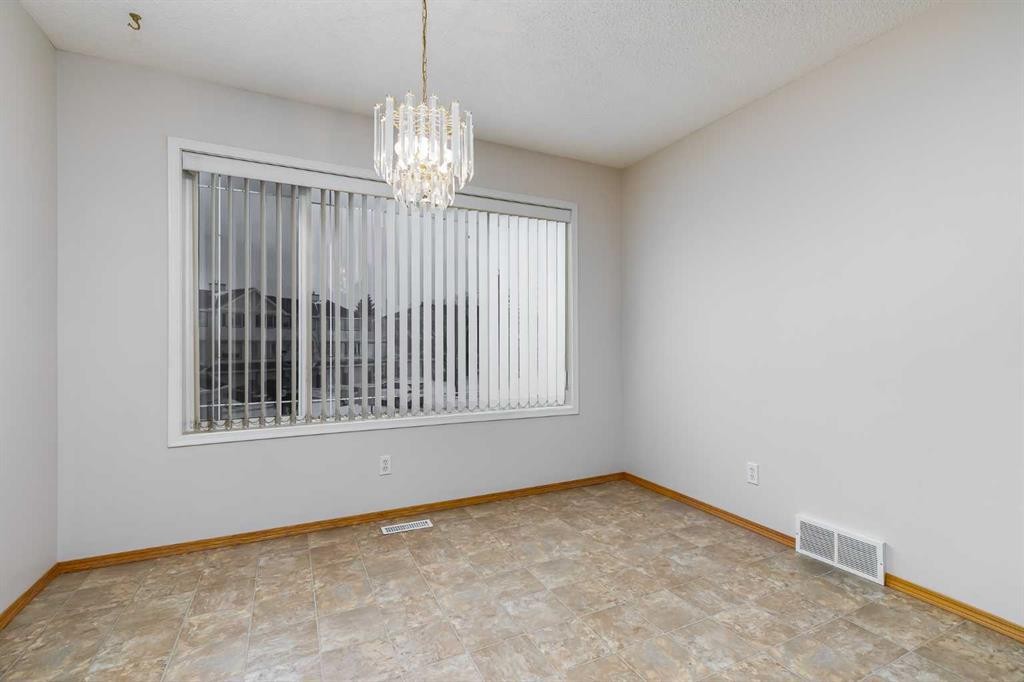 153 Rocky Ridge Court Nw, Calgary, AB - Indoor Photo Showing Other Room