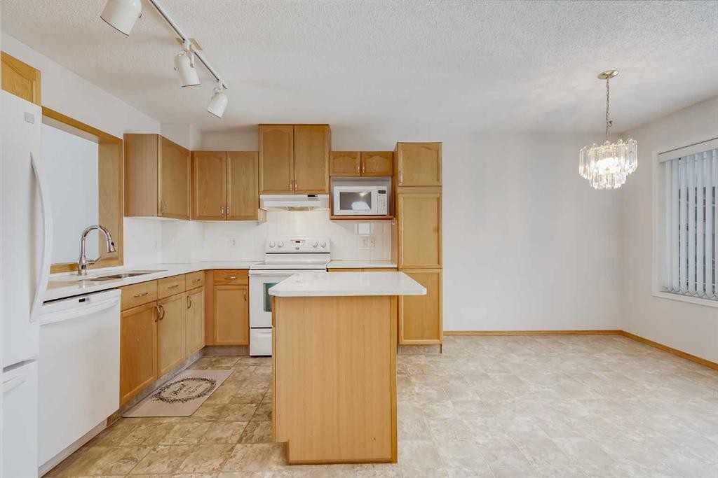 153 Rocky Ridge Court Nw, Calgary, AB - Indoor Photo Showing Kitchen