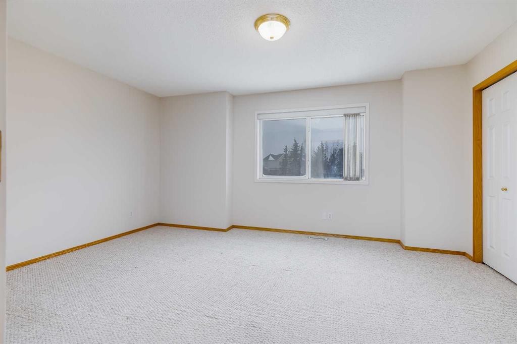 153 Rocky Ridge Court Nw, Calgary, AB - Indoor Photo Showing Other Room
