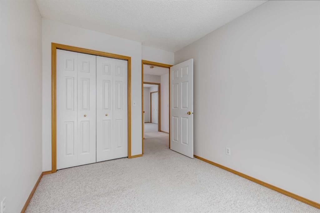 153 Rocky Ridge Court Nw, Calgary, AB - Indoor Photo Showing Other Room