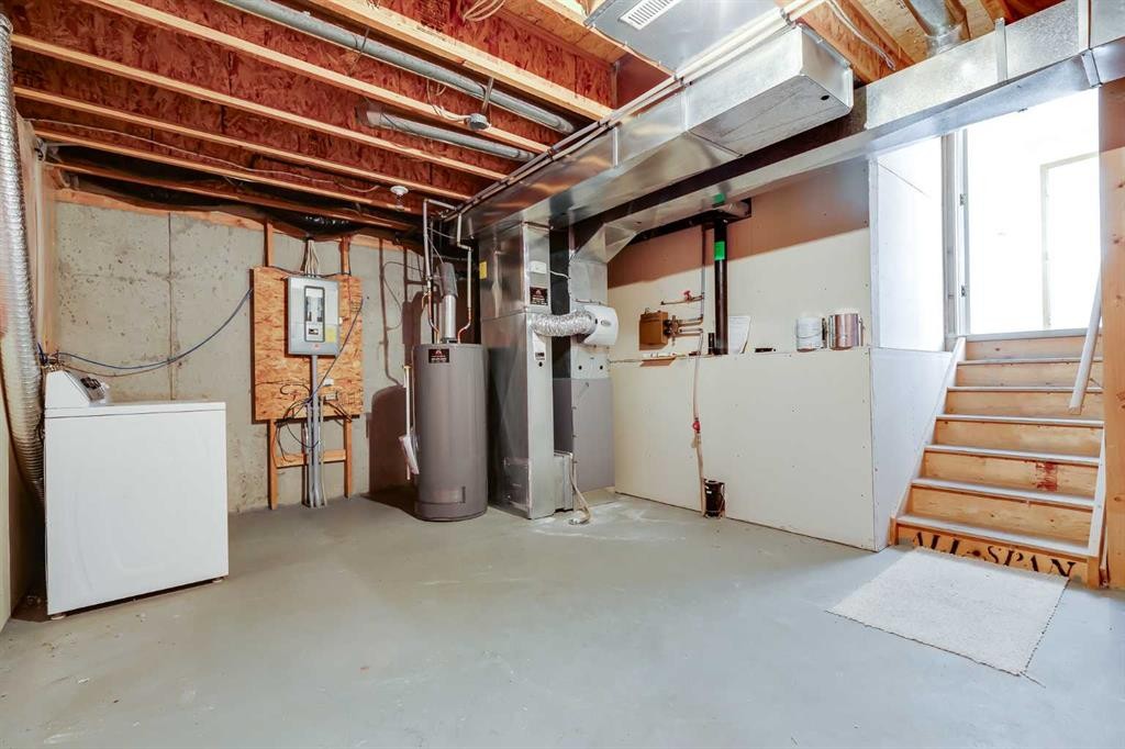 153 Rocky Ridge Court Nw, Calgary, AB - Indoor Photo Showing Basement