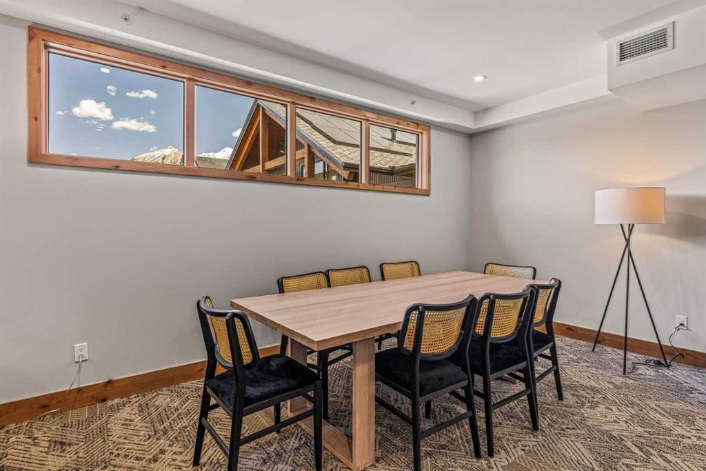 402-1315 Spring Creek Gate, Canmore, AB - Indoor Photo Showing Dining Room