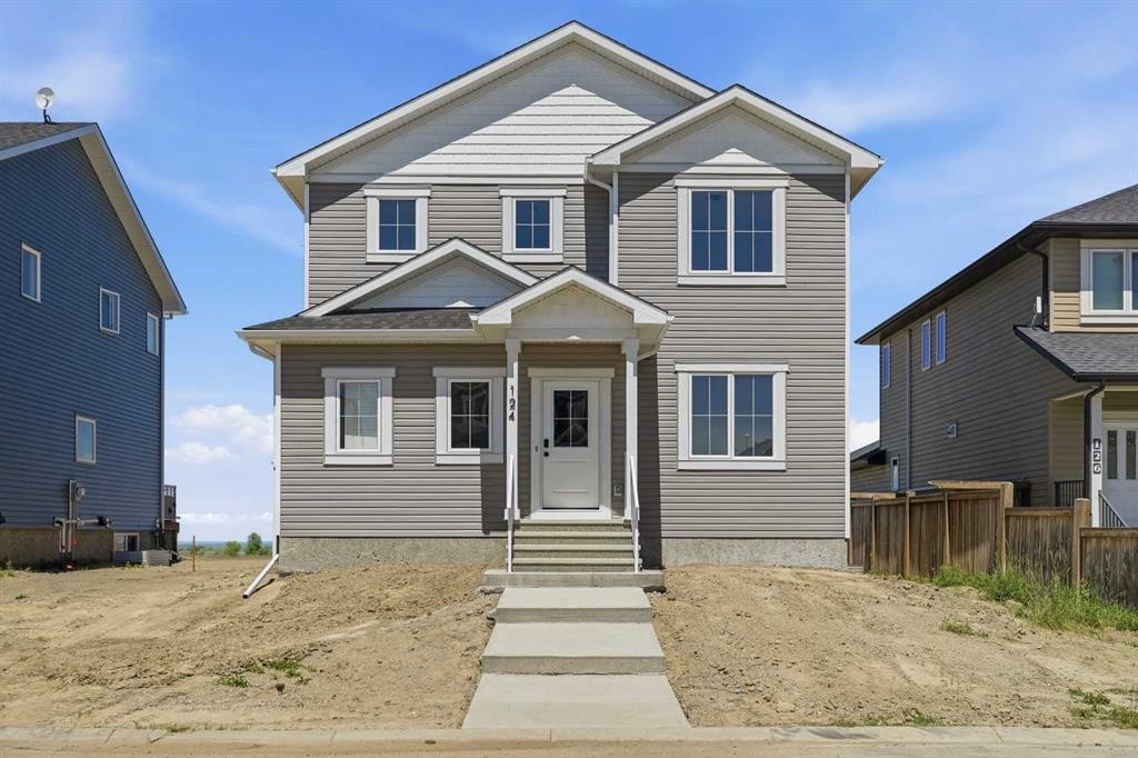 124 Coote Street, Cayley, AB - Outdoor With Facade