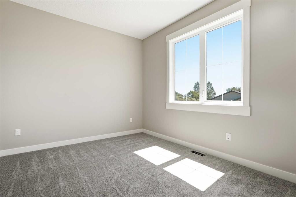 124 Coote Street, Cayley, AB - Indoor Photo Showing Other Room