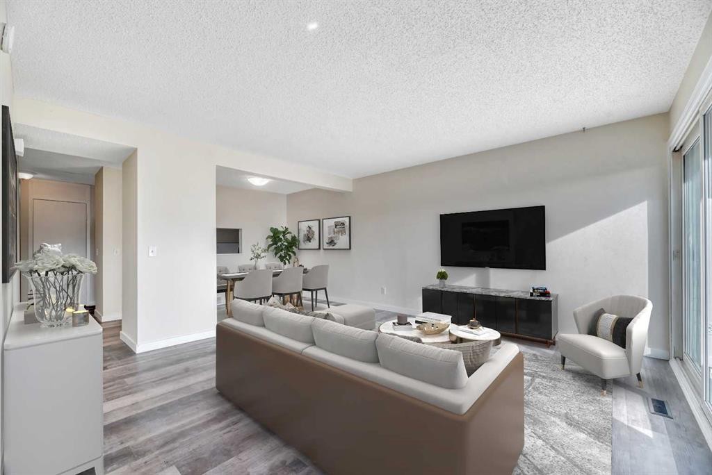 29-131 Templehill Drive Ne, Calgary, AB - Indoor Photo Showing Living Room With Fireplace