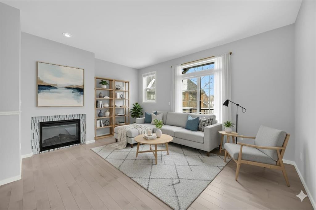 455 Ascot Circle Sw, Calgary, AB - Indoor Photo Showing Living Room With Fireplace