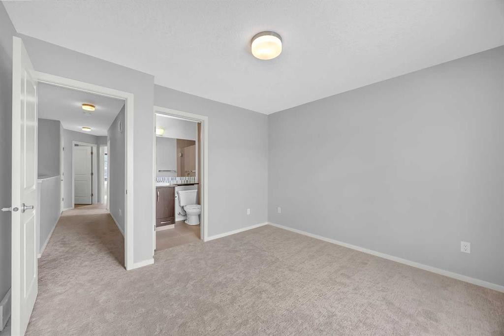 455 Ascot Circle Sw, Calgary, AB - Indoor Photo Showing Other Room