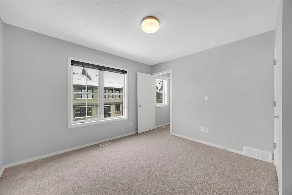 455 Ascot Circle Sw, Calgary, AB - Indoor Photo Showing Other Room