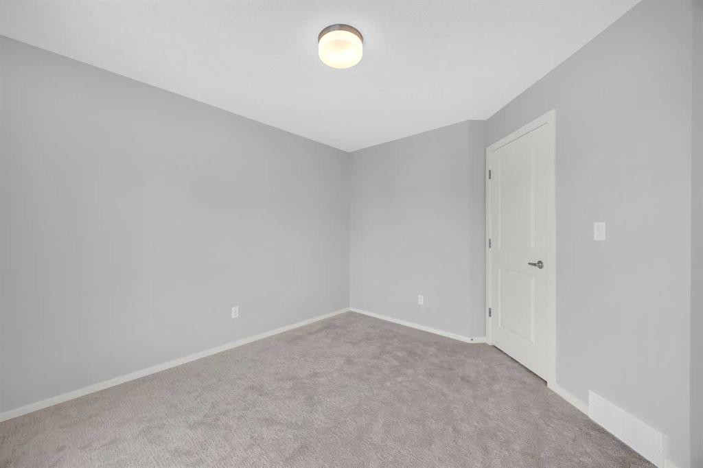 455 Ascot Circle Sw, Calgary, AB - Indoor Photo Showing Other Room