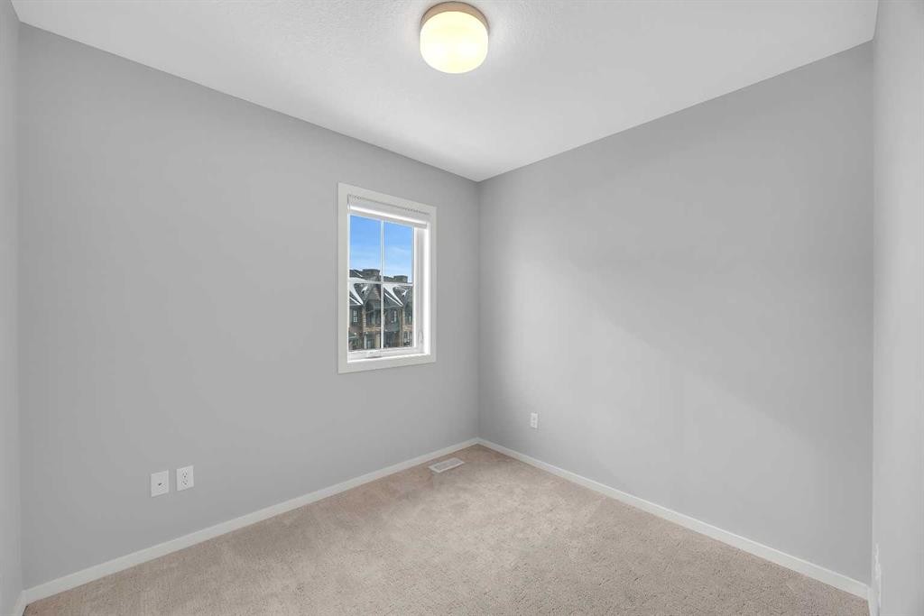 455 Ascot Circle Sw, Calgary, AB - Indoor Photo Showing Other Room