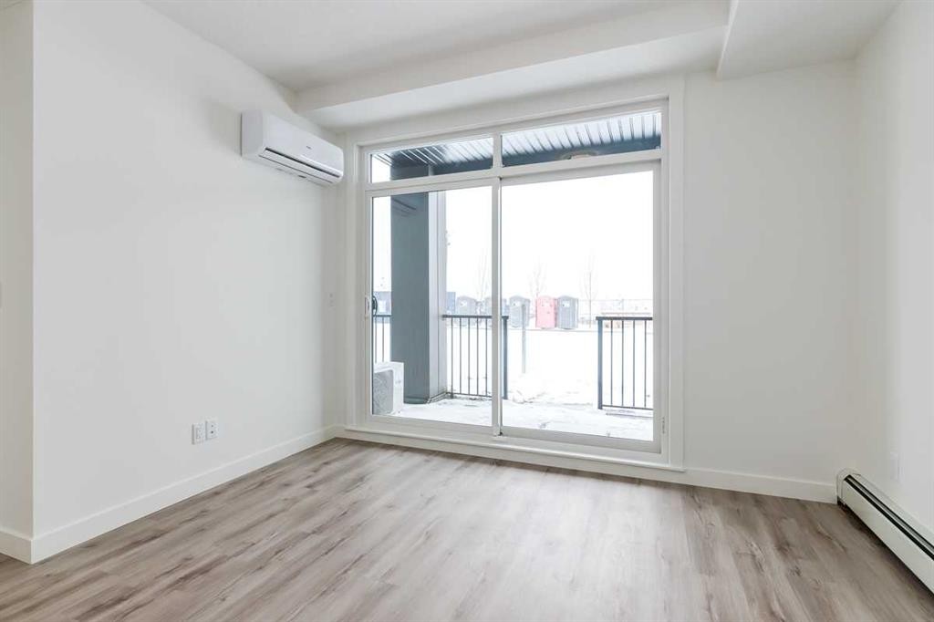 4111-200 Seton Circle Se, Calgary, AB - Indoor Photo Showing Other Room