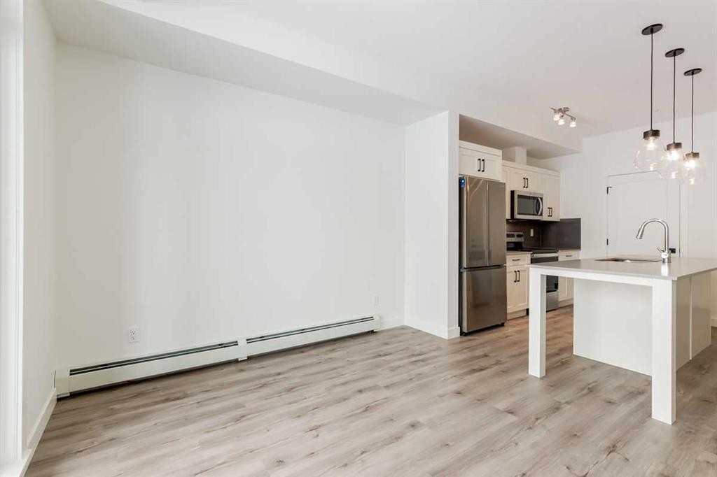 4111-200 Seton Circle Se, Calgary, AB - Indoor Photo Showing Kitchen