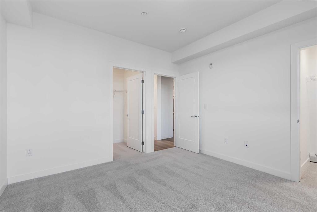 1308-520 Reynolds Avenue Sw, Airdrie, AB - Indoor Photo Showing Other Room