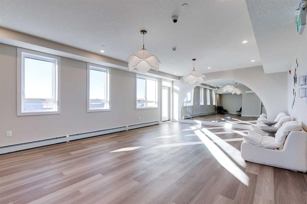 1308-520 Reynolds Avenue Sw, Airdrie, AB - Indoor Photo Showing Other Room