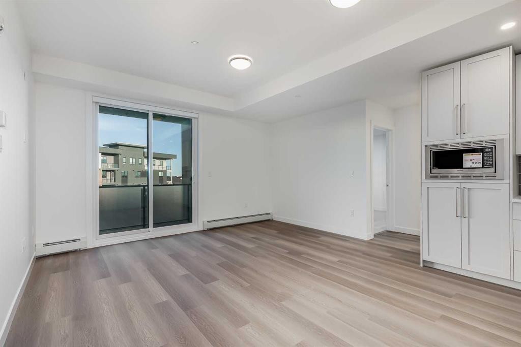 1308-520 Reynolds Avenue Sw, Airdrie, AB - Indoor Photo Showing Other Room