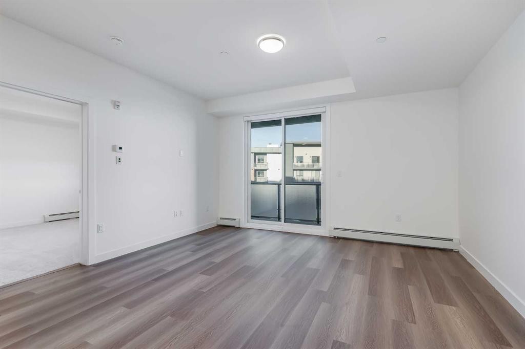 1308-520 Reynolds Avenue Sw, Airdrie, AB - Indoor Photo Showing Other Room