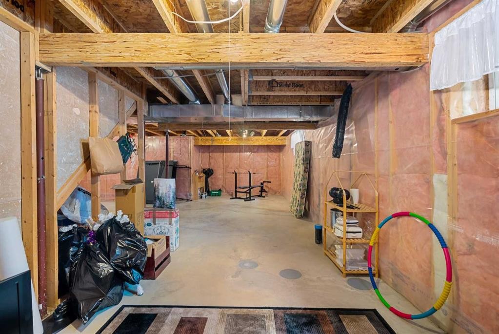 7945 Springbank Boulevard Sw, Calgary, AB - Indoor Photo Showing Basement
