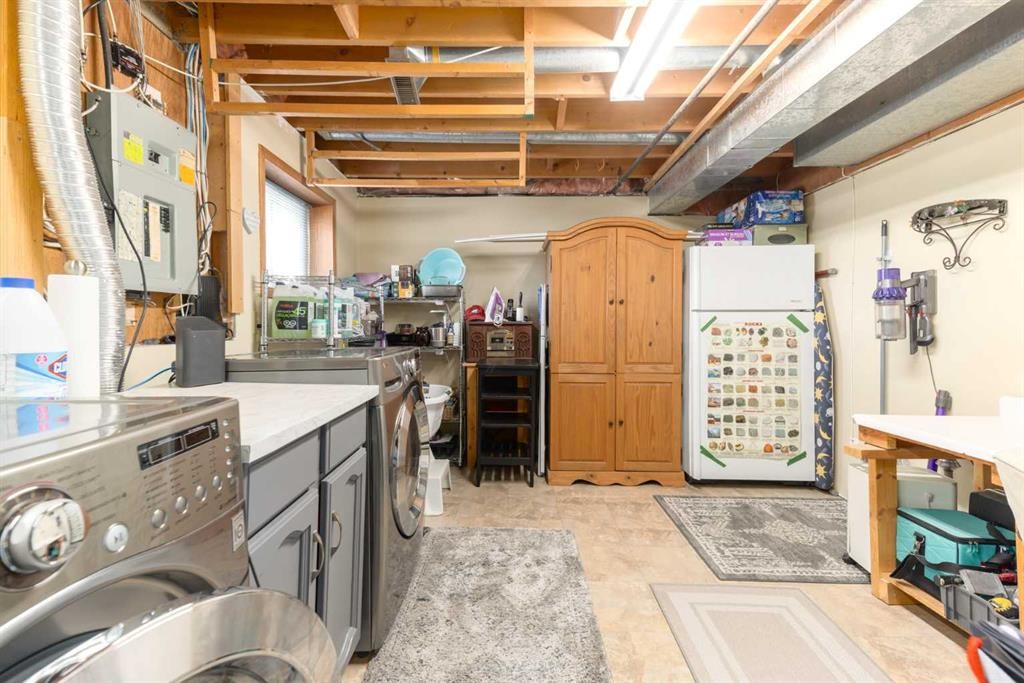 23 Whitlock Close Ne, Calgary, AB - Indoor Photo Showing Laundry Room
