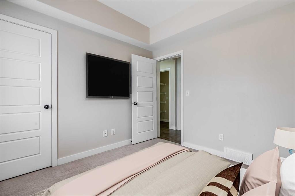1511-2461 Baysprings Link Sw, Airdrie, AB - Indoor Photo Showing Bedroom