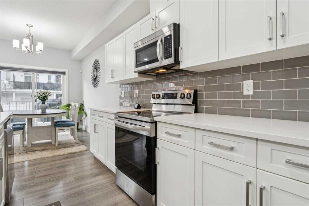 123 Walcrest Way Se, Calgary, AB - Indoor Photo Showing Kitchen With Upgraded Kitchen