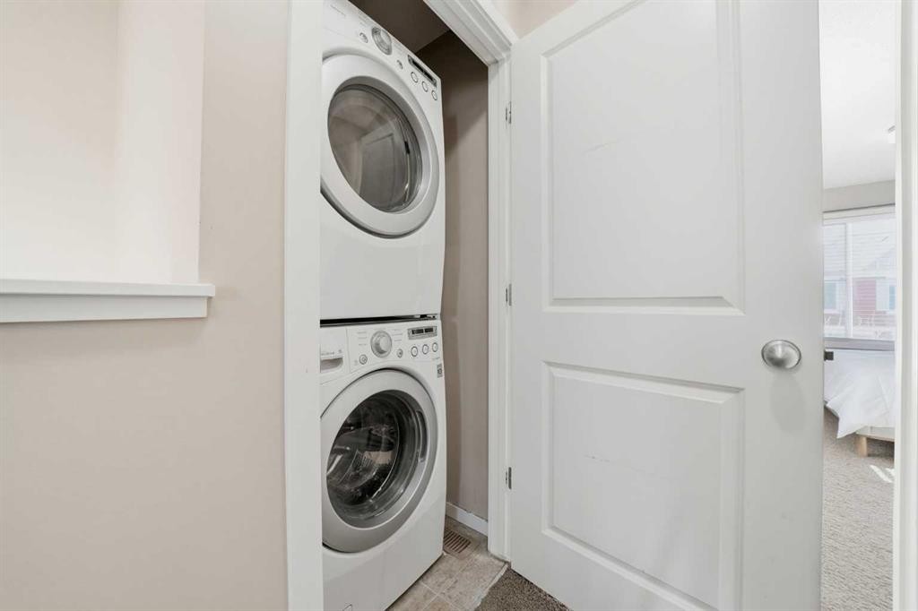 176 Evansview Gardens Nw, Calgary, AB - Indoor Photo Showing Laundry Room