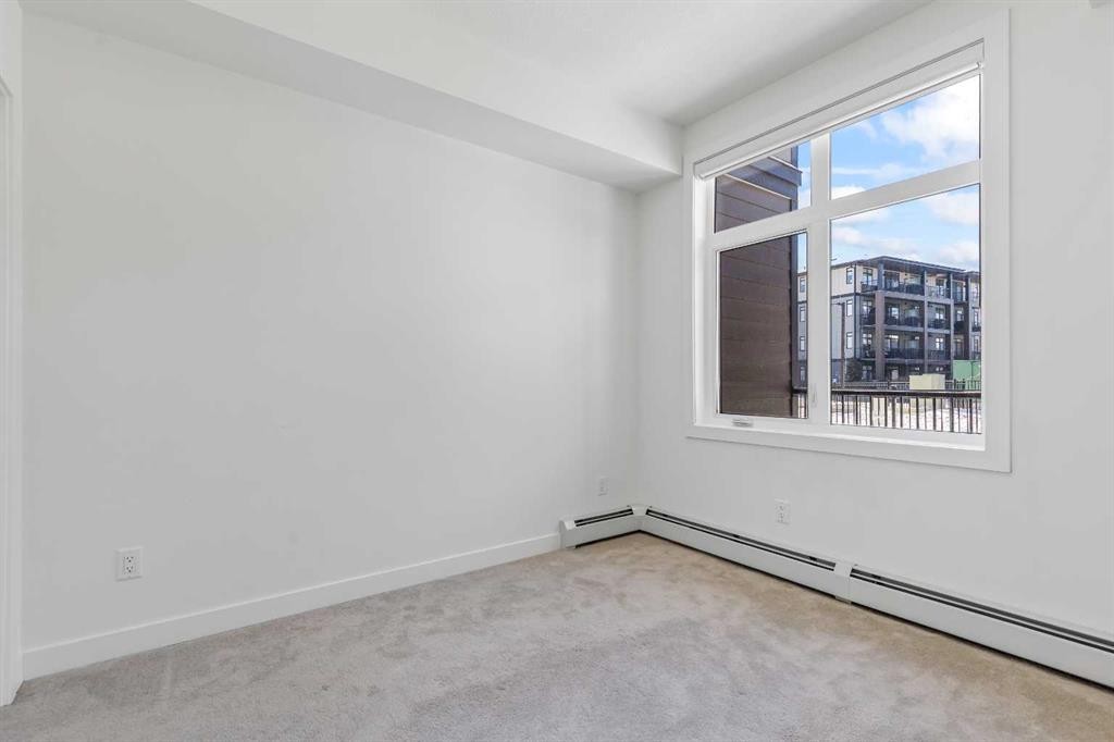 2113-200 Seton Circle Se, Calgary, AB - Indoor Photo Showing Other Room