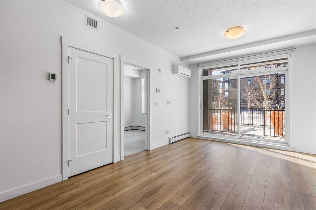 2113-200 Seton Circle Se, Calgary, AB - Indoor Photo Showing Other Room