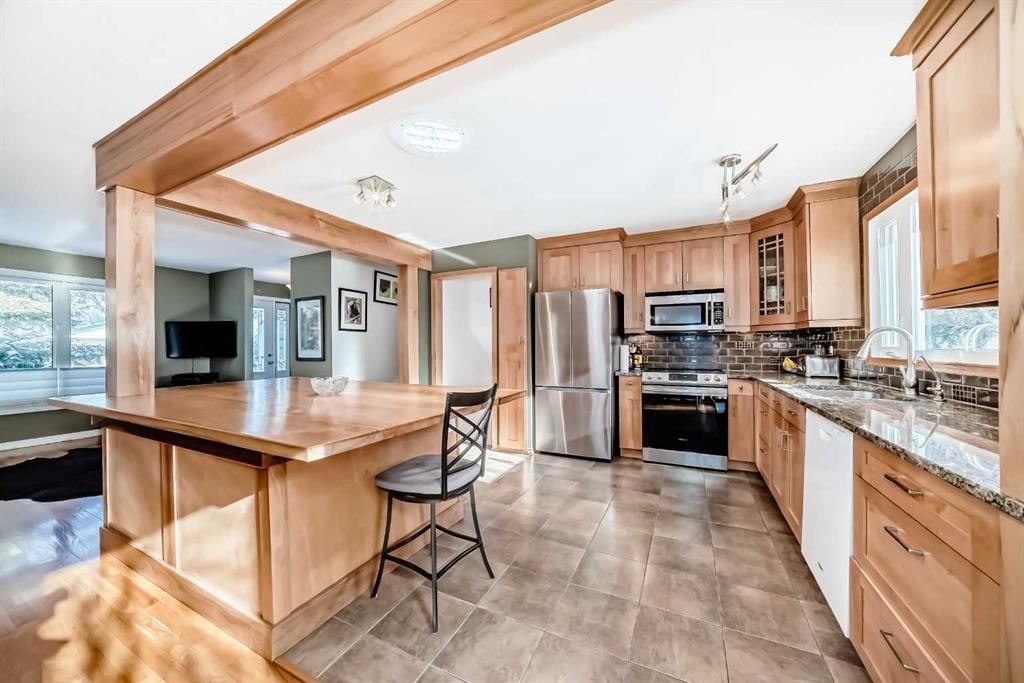 507 Brookpark Drive Sw, Calgary, AB - Indoor Photo Showing Kitchen With Double Sink