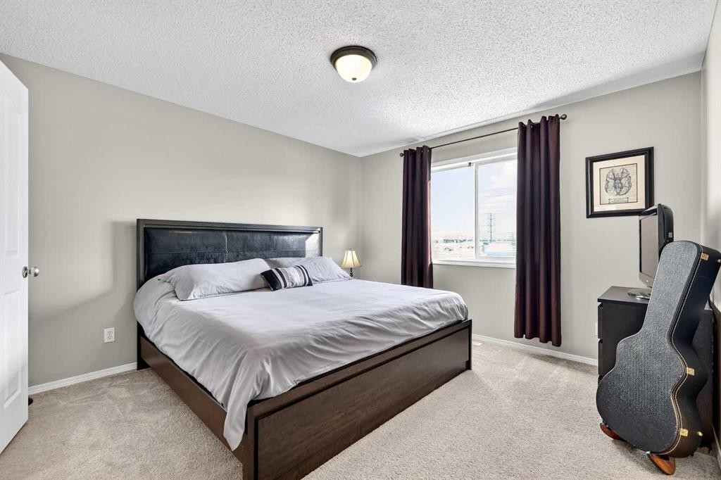 88 Cramond Green Se, Calgary, AB - Indoor Photo Showing Bedroom