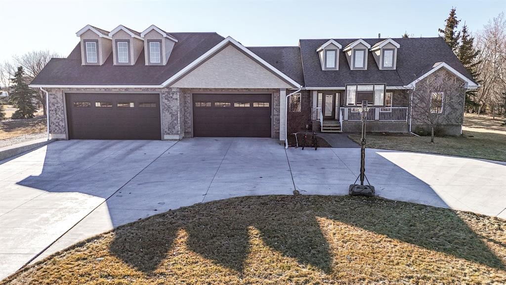 109 Derochie Drive, Claresholm, AB - Outdoor With Deck Patio Veranda With Facade