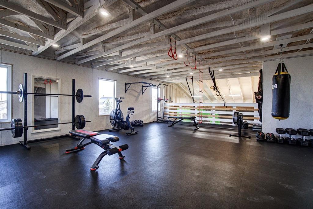 109 Derochie Drive, Claresholm, AB - Indoor Photo Showing Gym Room