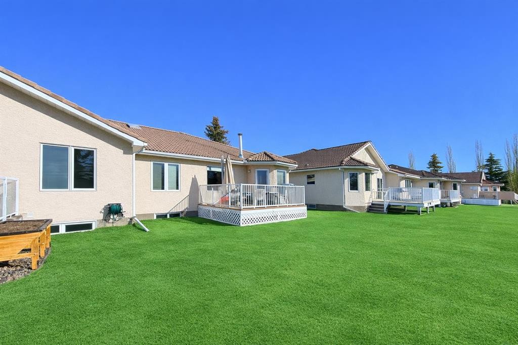 135 Hamptons Park Nw, Calgary, AB - Outdoor With Deck Patio Veranda With Backyard With Exterior