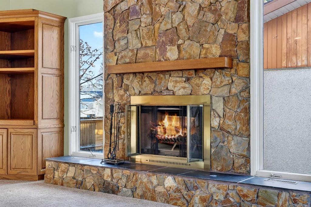 5315 Valiant Drive Nw, Calgary, AB - Indoor Photo Showing Other Room With Fireplace