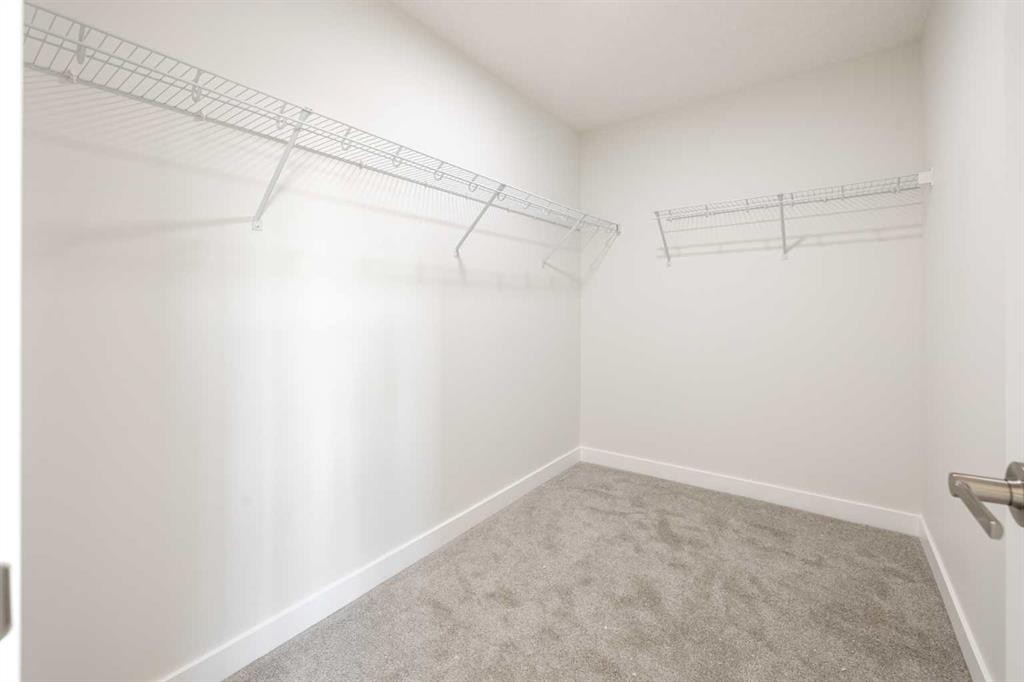 182 Sora Way Se, Calgary, AB - Indoor With Storage
