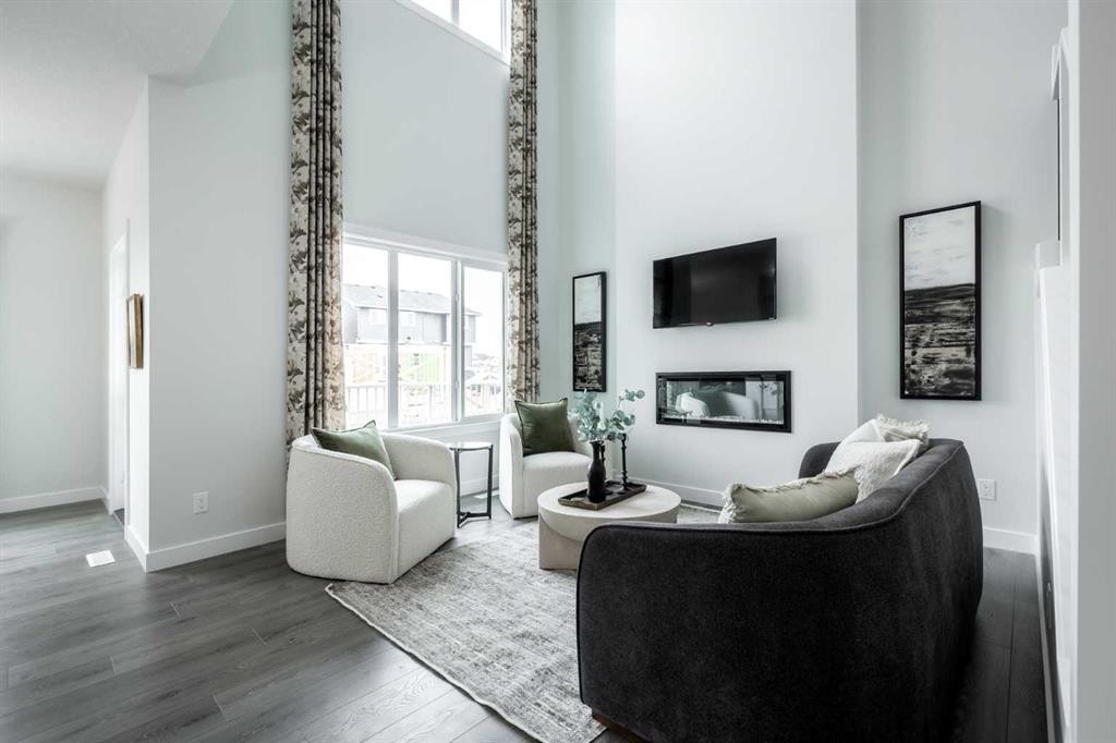 178 Sora Way Se, Calgary, AB - Indoor Photo Showing Living Room With Fireplace