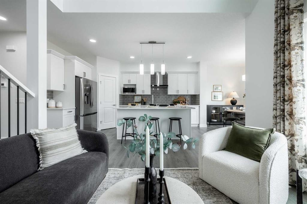 178 Sora Way Se, Calgary, AB - Indoor Photo Showing Living Room