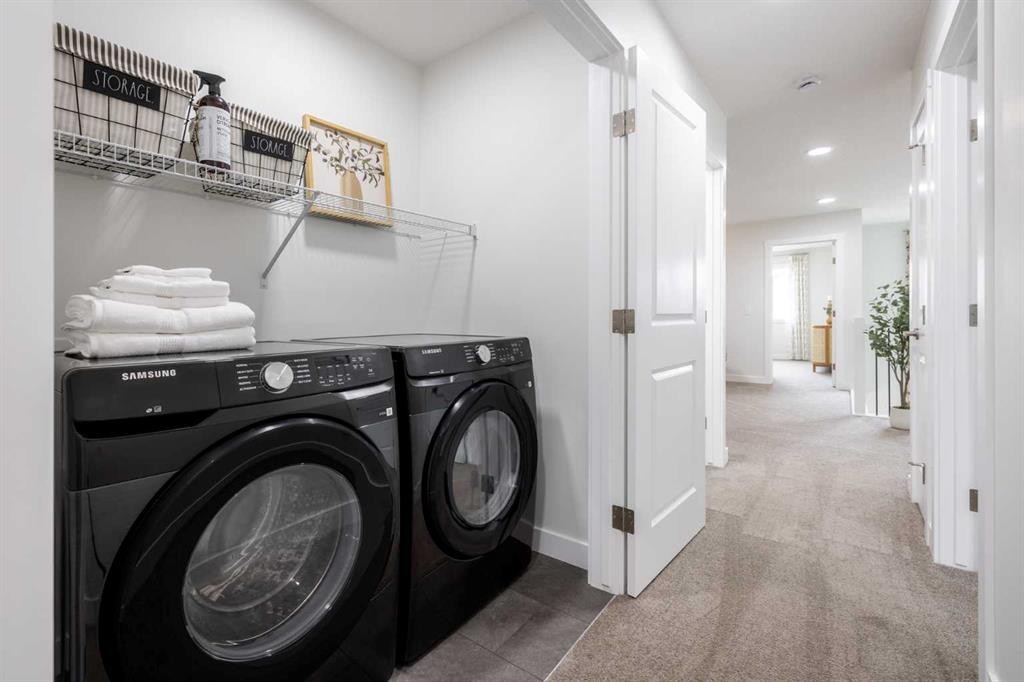 178 Sora Way Se, Calgary, AB - Indoor Photo Showing Laundry Room