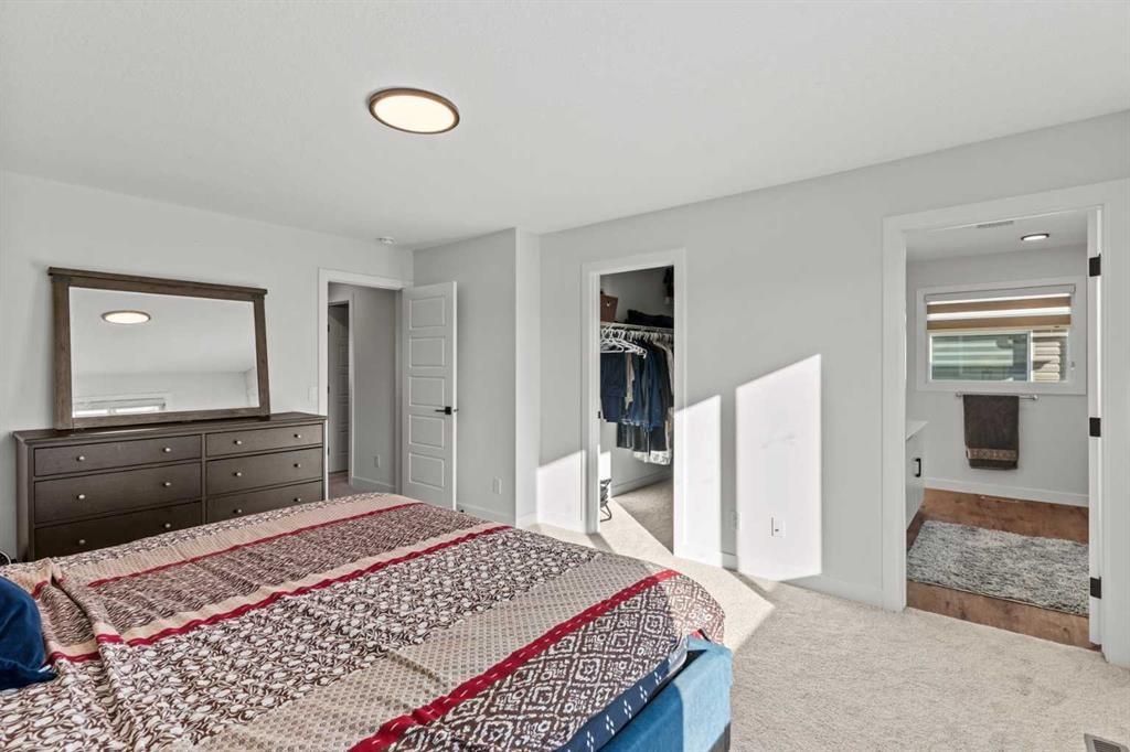 116 Ambleside Crescent Nw, Calgary, AB - Indoor Photo Showing Bedroom