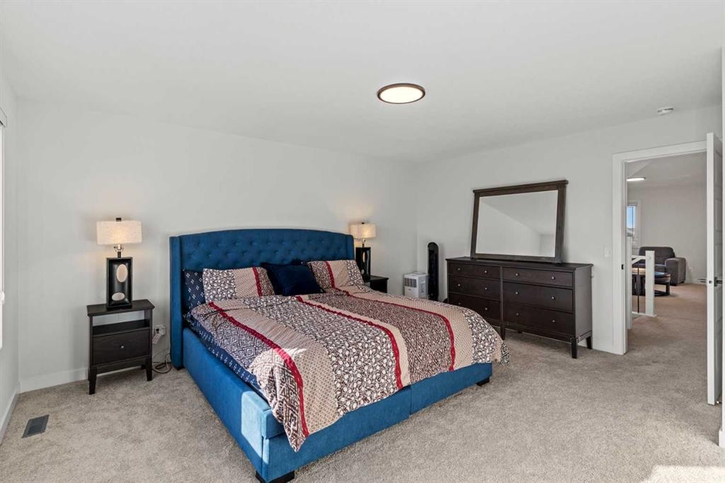 116 Ambleside Crescent Nw, Calgary, AB - Indoor Photo Showing Bedroom